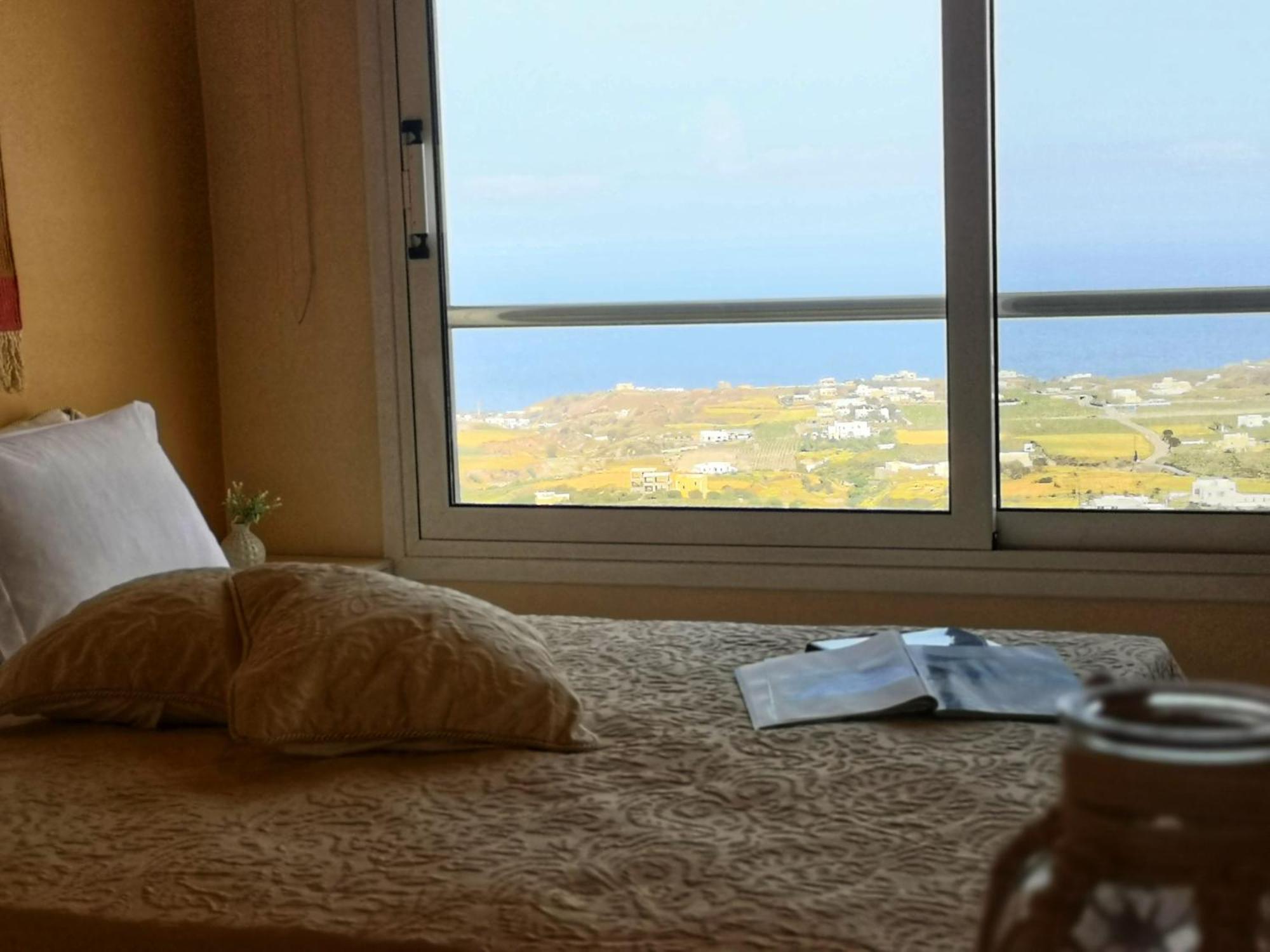 فندق أجنحة أميريسا ثيرا الغرفة الصورة